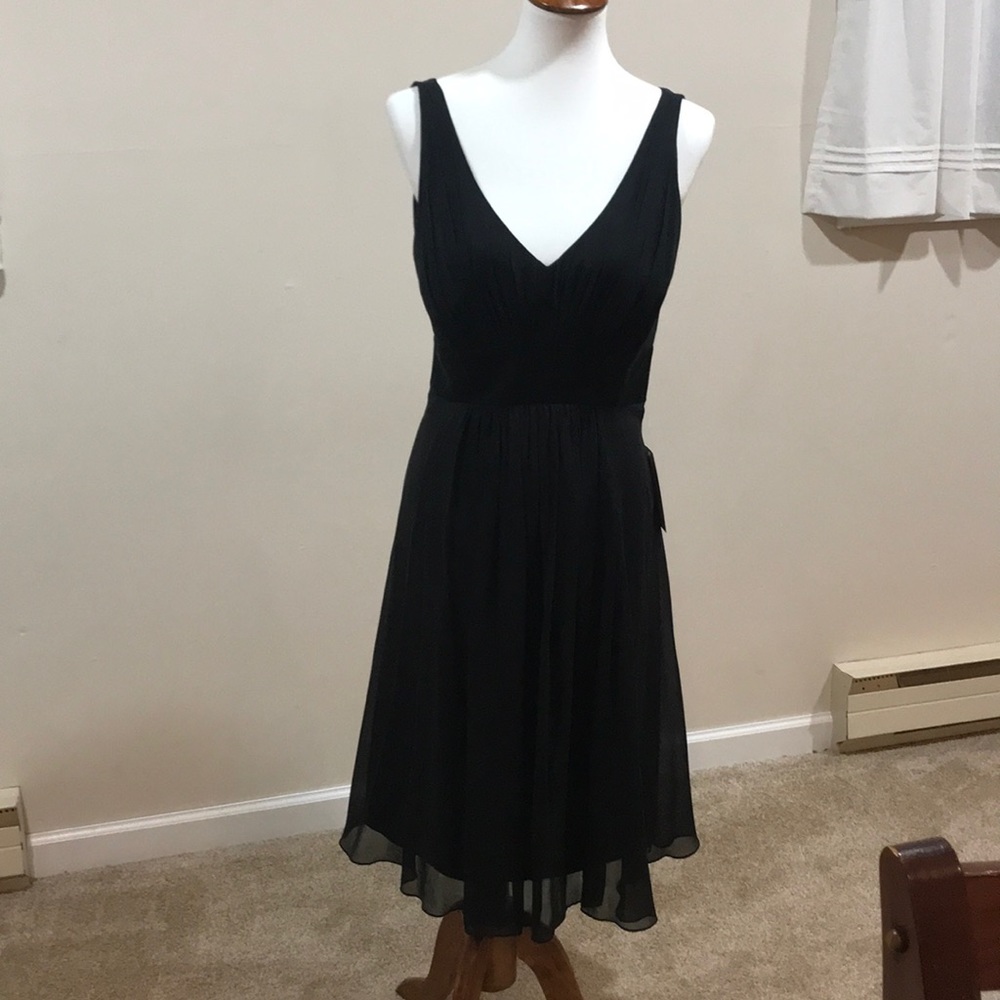 Never worn, new with tags cocktail dress.